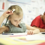 Young girl learning French at La Maternelle